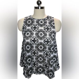 Mesh blouse in black and white print. Small.
